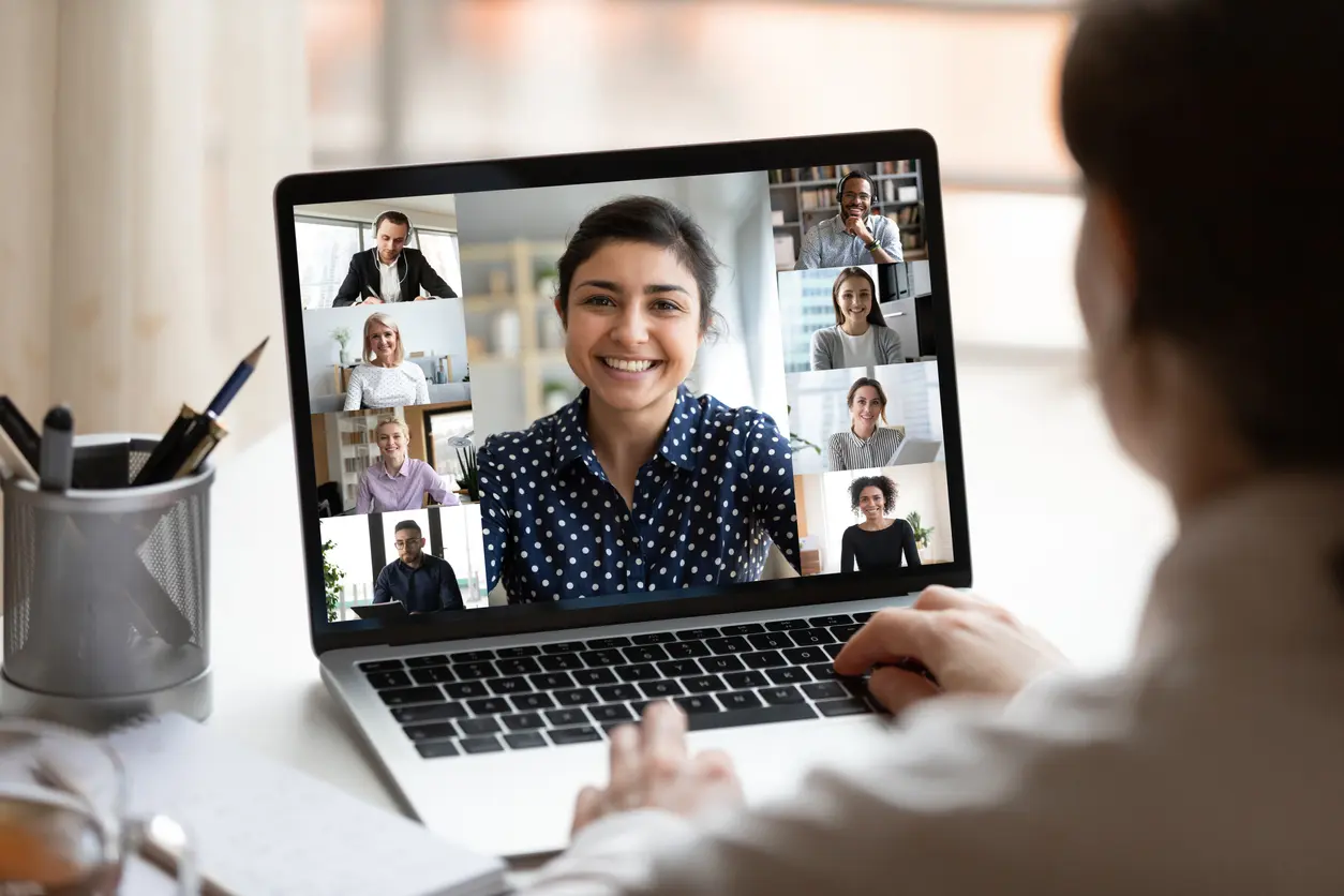 AIMH Indian lady lead videocall, pc screen view over woman shoulder