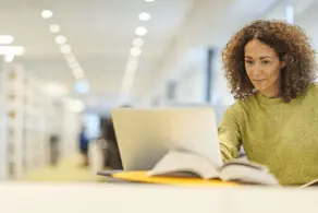 AIMH | Image showing a women working on a laptop