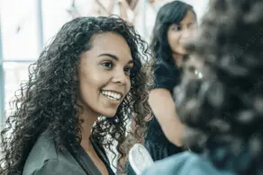 AIMH | Image showing a women engaging with other practisioners