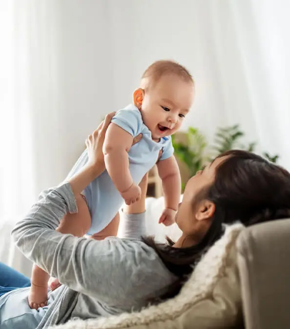 AIMH | Image showing a mother holding a baby